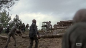 The Bridge- Logs roll down and crush walkers- AMC, The Walking Dead