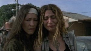 Stradivarius- Magna and Yumiko watch as Michonne kills Bernie- The Walking Dead, AMC