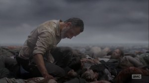 What Comes After- Rick on the pile of dead bodies- The Walking Dead, AMC