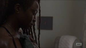 Who Are You Now- Michonne holds one of Rick's shirts- The Walking Dead, AMC