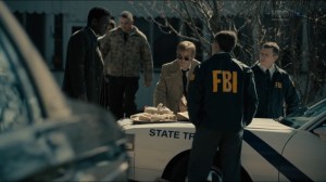 The Big Never- Wayne, Roland, and detectives go over toys found in bag- HBO, True Detective