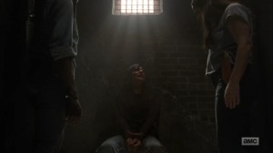 Adaptation- Michonne, Tara, and Daryl interrogate the prisoner- AMC, The Walking Dead