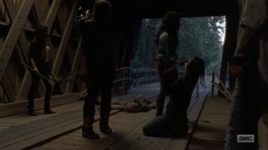 Adaptation- Uncovering one of the humans dressed as a walker- AMC, The Walking Dead