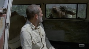 Adaptation- Walker interrupts Negan's snack time- AMC, The Walking Dead