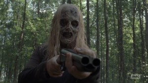 Adaptation- Walker points a gun at Alden and Luke- AMC, The Walking Dead