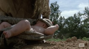 Bounty- Whisperer sets baby on the ground- AMC, The Walking Dead