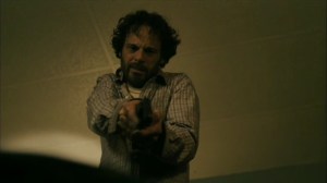 Hunters in the Dark- Tom points a gun at Dan- HBO, True Detective