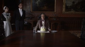 It's Summer and We're Running Out of Ice- Adrian Veidt, played by Jeremy Irons, about to blow out the candle- HBO, Watchmen