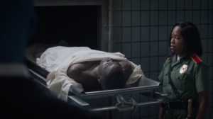 A God Walks Into a Bar- Angela pulls out the body of Calvin Jelani- HBO, Watchmen