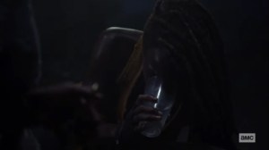What We Become- Virgil offers Michonne a glass of water- AMC, The Walking Dead