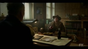 Raddoppiarlo- Dick ‘Deafy’ Wickware, played by Timothy Olyphant, speaks to the police captain- Fargo, FX