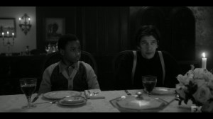 East West- Satchel and Rabbi at the table for dinner- Fargo, FX