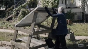 Diverged- Carol works on a solar panel- AMC, The Walking Dead
