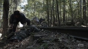 Diverged- Daryl searches a walker for supplies- AMC, The Walking Dead