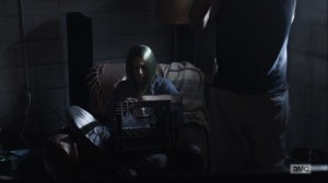 Here's Negan- Lucille, played by Hilarie Burton Morgan, tries to pick a James Bond movie to watch- AMC, The Walking Dead