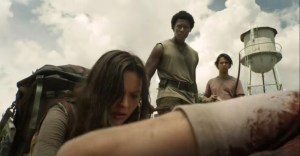 Warlords- Lydia, Elijah, and Marco aid an injured man- AMC, The Walking Dead