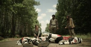 Warlords- Maggie, Lydia, and Elijah inspect the dead Commonwealth troopers- AMC, The Walking Dead