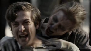 A New Deal- Walker about to bite Sebastian- AMC, The Walking Dead